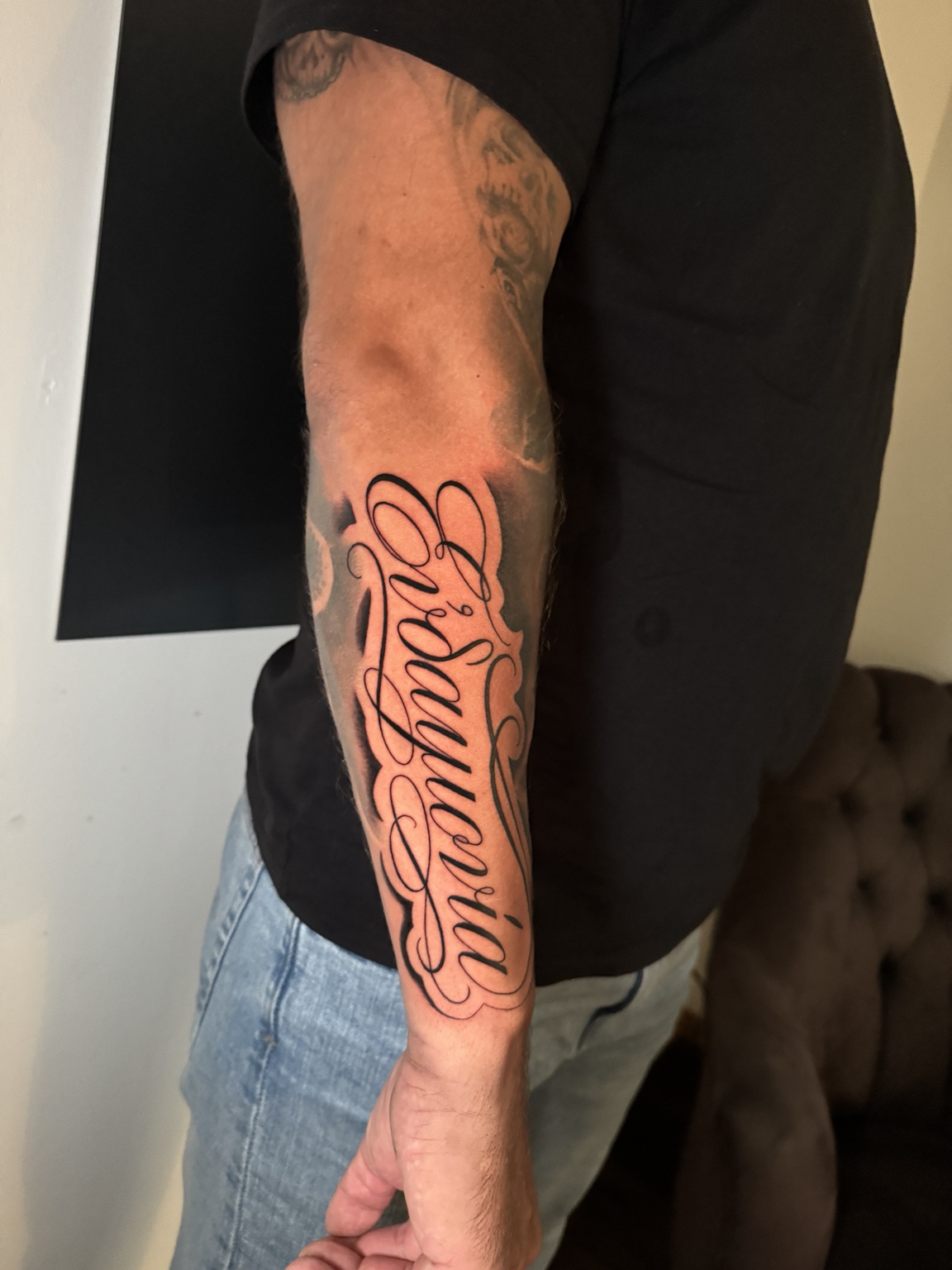 Calligraphy tattoo by John Paul Curtis